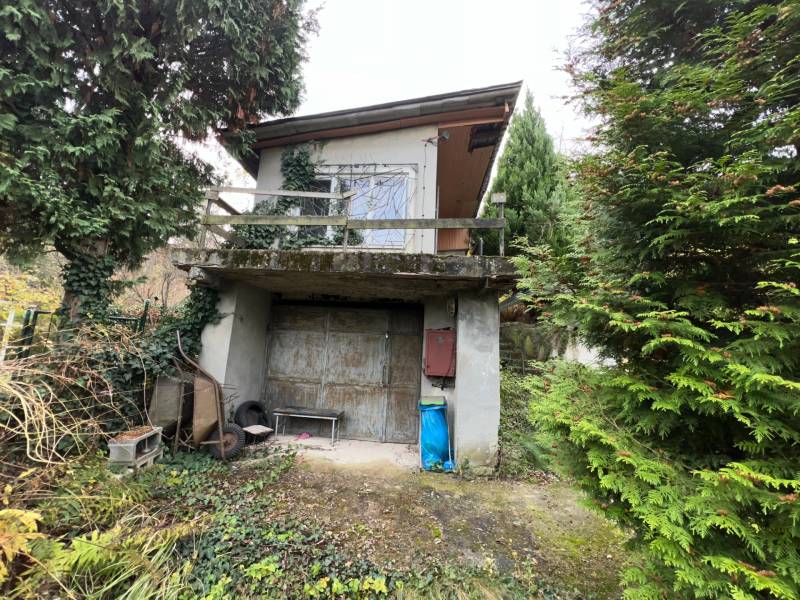 A cottage on Pod Srdcom Street in Bratislava - Devínska Nová Ves surrounded by greenery.
