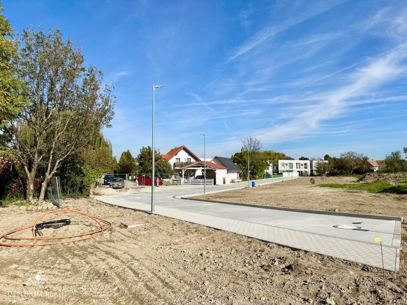 On the street, there is a construction project in Malinovo, plots prepared for living.