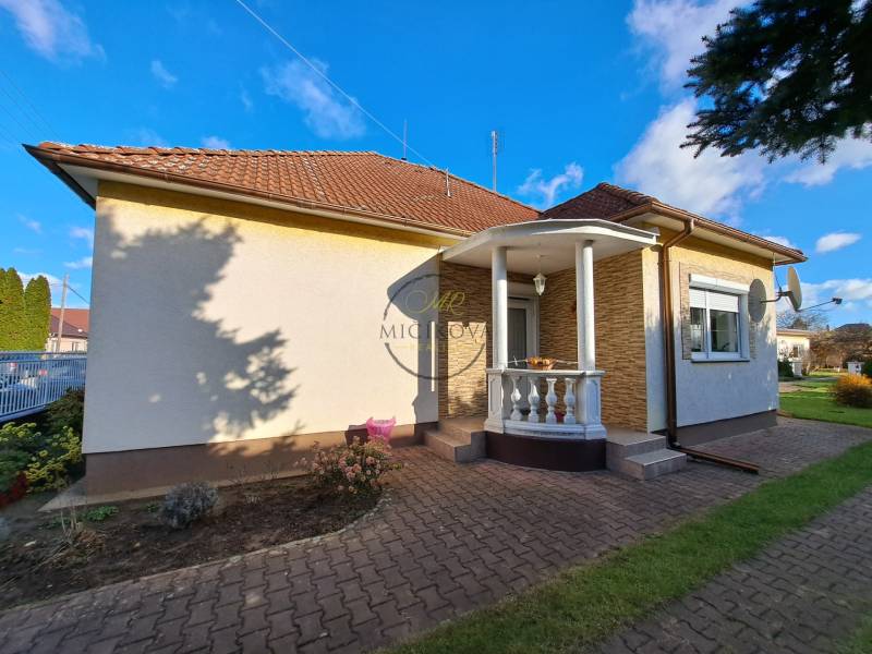 A family house on Bernolákova Street in Vráble with a brick roof and a garden.