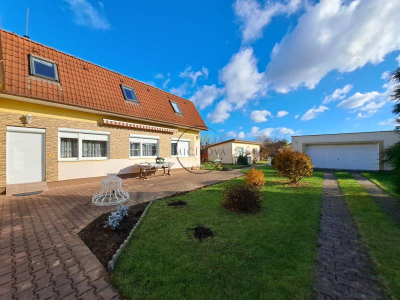 Family house on Bernolákova Street in Vráble, with a courtyard, garage, and garden.
