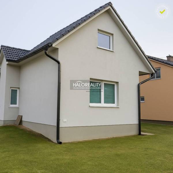 A family house in Kľačno with a simple facade and a sloped roof.