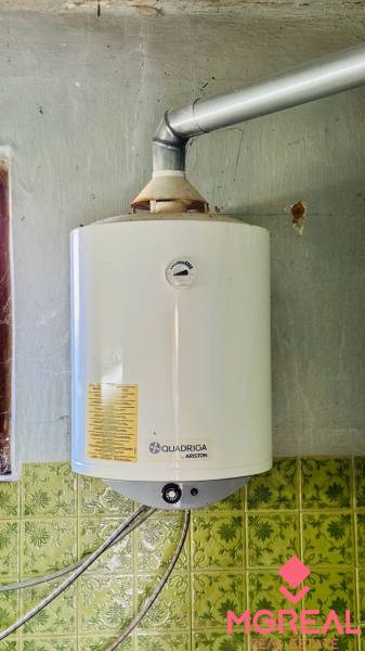 Quadriga Ariston brand boiler on the wall in a family house.
