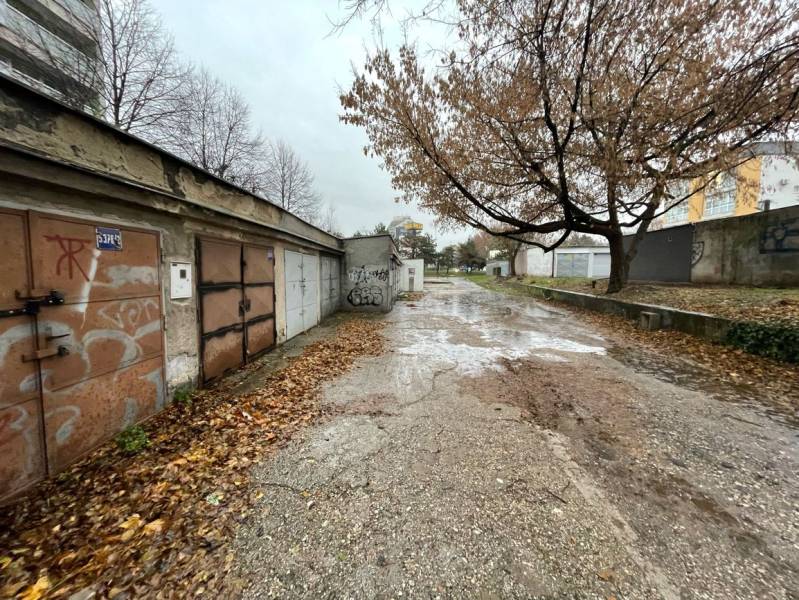 Garages on Priekopy Street in Bratislava-Ružinov with graffiti and an autumn atmosphere.