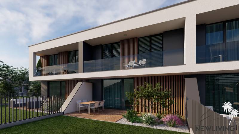 Family house in Piešťany with a glazed balcony and a terrace in a green garden.