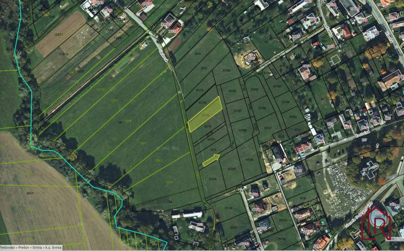 Aerial view of plots - housing in the village of Svinia. Accessible green plots.