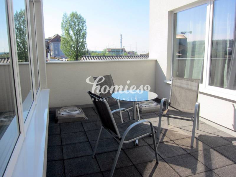 Terrace with two chairs and a table in the offices on Štúrova Street, Nitra.