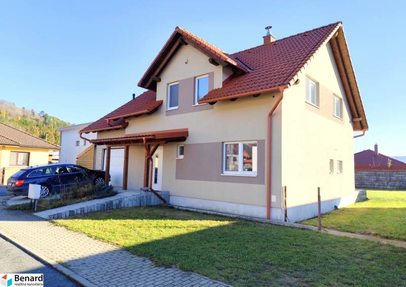 A family house on Rovinky Street in Lipany with a pitched roof and a garage.