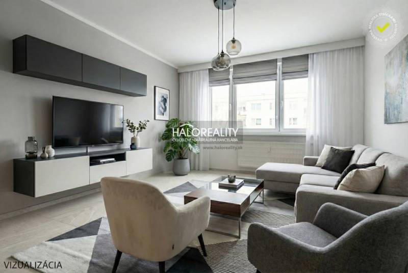 Living room in a 3-room apartment with a large sofa, TV, carpet, and wooden decor flooring.