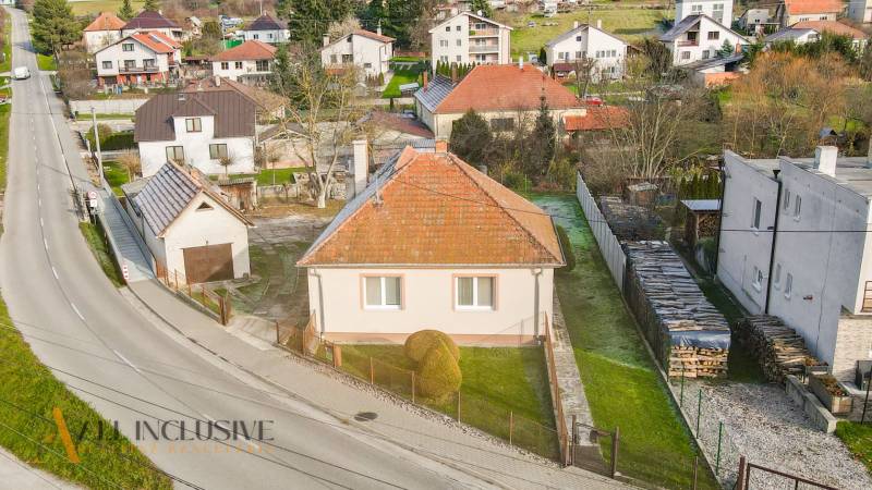 A family house on Nemečkovská Street in Prašice with two windows and a sloped roof.