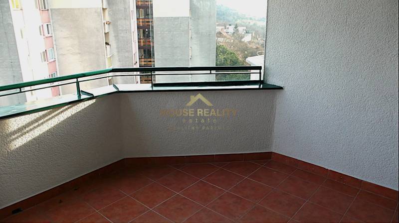 A balcony with tiles in a 4-room apartment on Martinengova Street in Bratislava - Old Town.