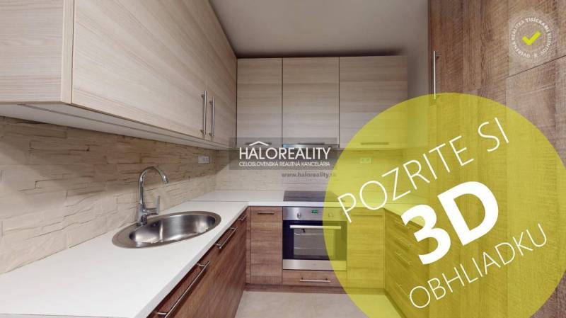 A kitchen in a 2-room apartment with a wooden decor floor and built-in cabinets.