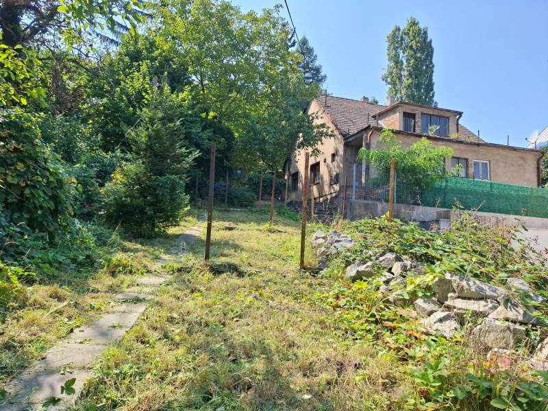 A family house on Búdková Street, surrounded by greenery in Bratislava - Staré Mesto.
