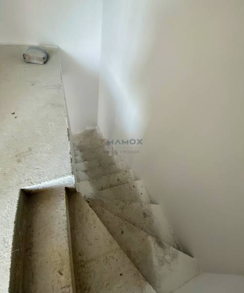 Interior staircase in a family house awaiting completion.