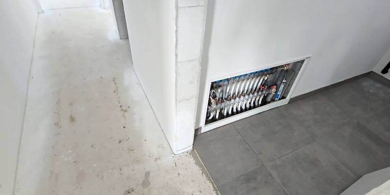 Hallway in a family house with wiring and tiles in Piešťany.