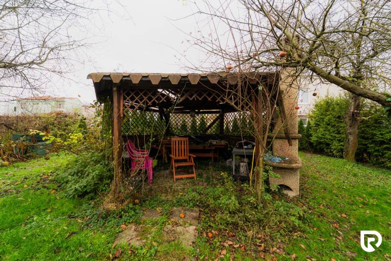The garden of a family house on Partizánska Street in Bánovce nad Bebravou, a gazebo with furniture.