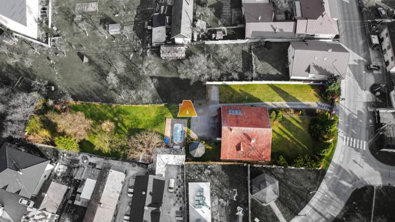 Aerial view of a villa on Andrej Sládkovič Street in Žarnovica with a pool and garden.
