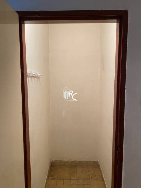 A small storage space with tiles in a 2-room apartment.