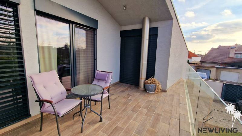 On Jánošíkova Street, there is a terrace of a family house with cozy seating.