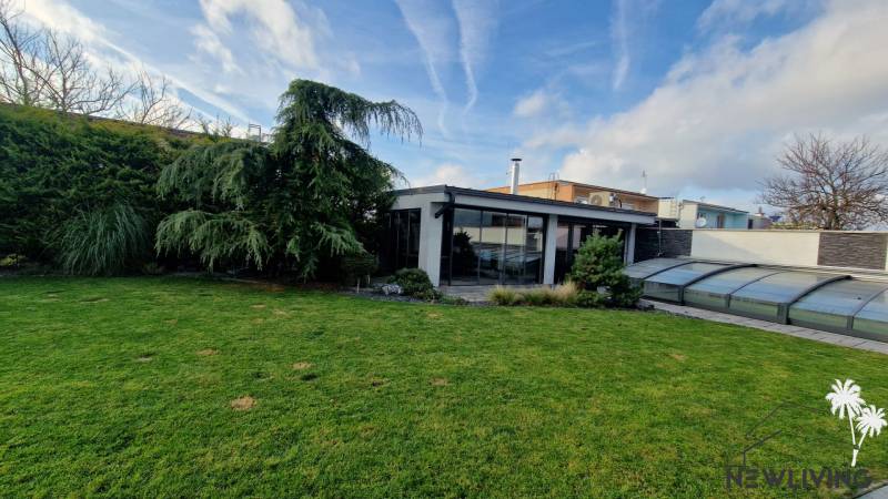 A family house on Jánošíkova Street in Piešťany, with a plot of land and a swimming pool in the garden.