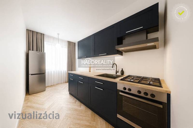 A kitchen in a 3-room apartment with dark furniture and a wooden decor floor.