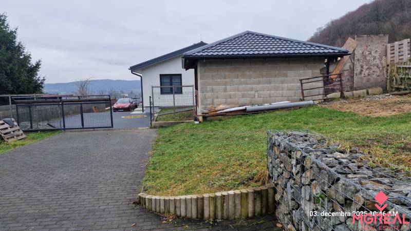 A family house on Kopaninova Street in Sokolí with a landscaped garden and a view of the countryside.