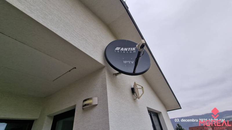 Satellite dish on the facade of a family house on Kopaninova Street in Sokoľ.