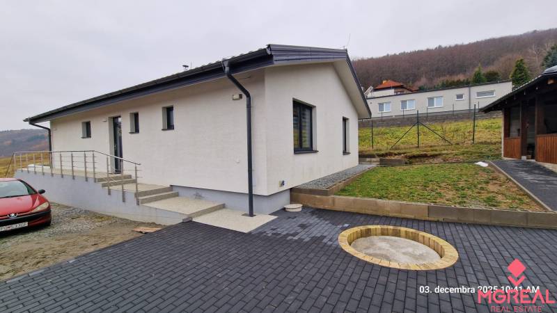 Family house on Kopaninova Street in Sokolí, with a paved courtyard and staircase.