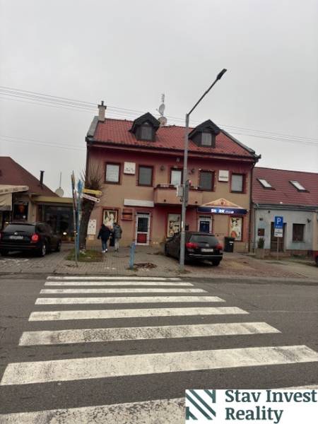 Two-story building with offices and commercial spaces in the town of Senec.