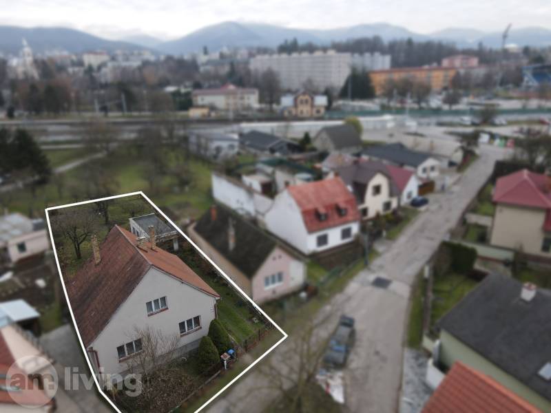 A family house on Nerudova Street in Dubnica nad Váhom with a view of the surrounding buildings.