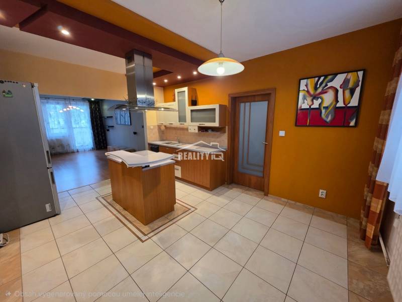 A kitchen with light tiles and a wooden decor floor in a 4-room apartment.