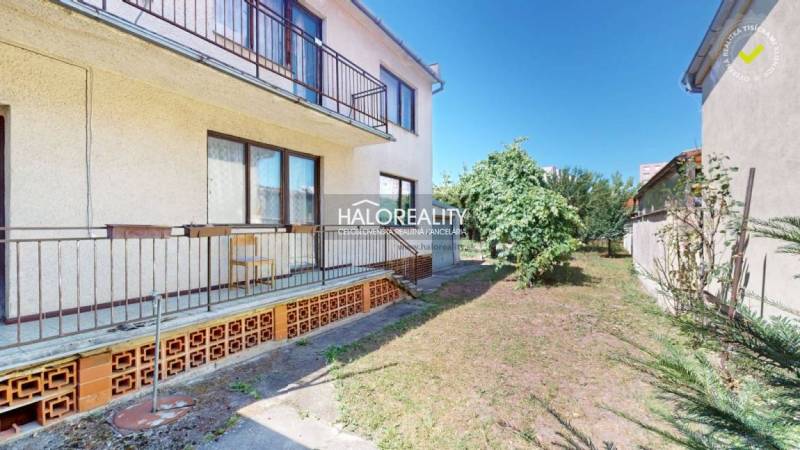 Family house in Malacky with a spacious garden, terrace, and green front yard.