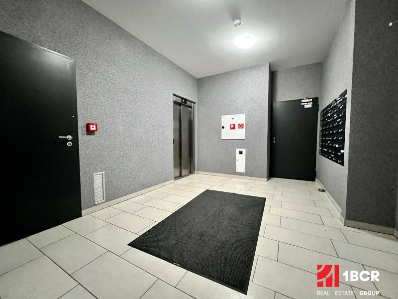 Apartment entrance on Yellow Street in Bratislava - Petržalka with elevators and mailboxes.