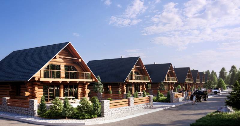 The construction of houses in Nová Lesná captures a series of wooden mountain cottages with terraces.