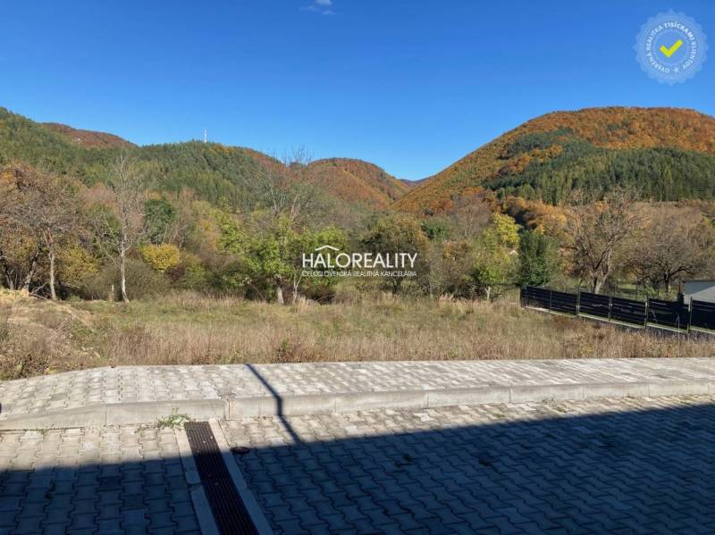 Autumn landscape in Kľačno with a hilly background. Land - residential for sale.
