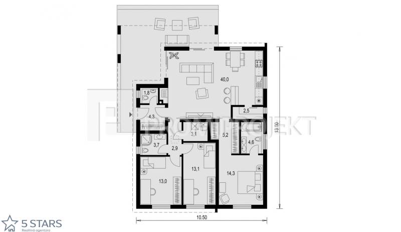 Floor plan of a family house with a large living room, kitchen, and three bedrooms.