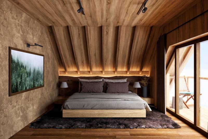 Bedroom with wood-patterned flooring, large window, and comfortable bed, Home construction.
