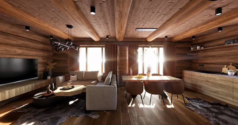 Wooden interior with wood-patterned flooring, sofa, and table, house construction.