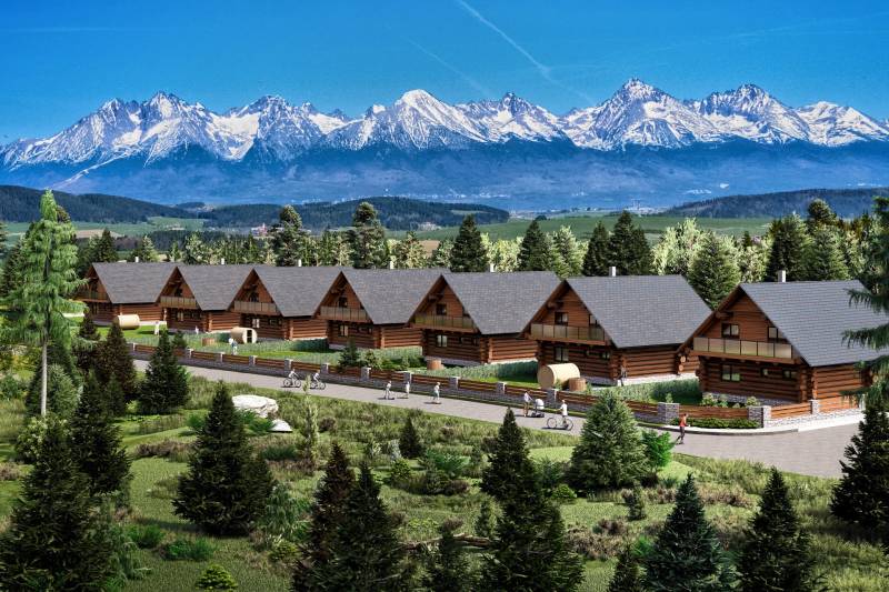 Construction of houses in Nová Lesná with a view of the snow-capped peaks of the Tatras.
