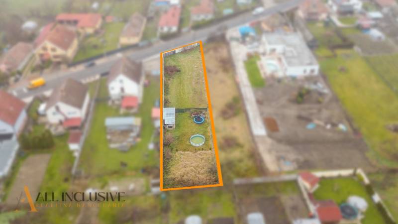 Plots for residential use in Jahodná, depicted includes a yard with a circular pool and a shelter.