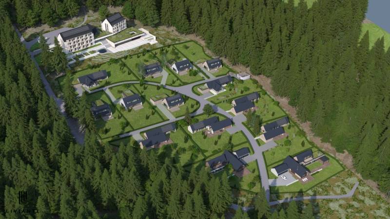 Development plots in Tajov with modern houses surrounded by nature and forest.
