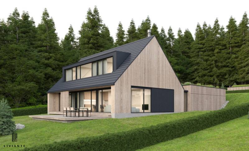 A wooden house in the village of Tajov surrounded by forest, ideal for development plots.