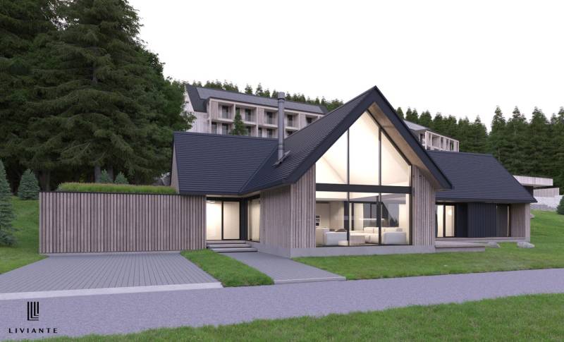 Modern architecture at development plots in Tajov, surrounded by a wooded environment.