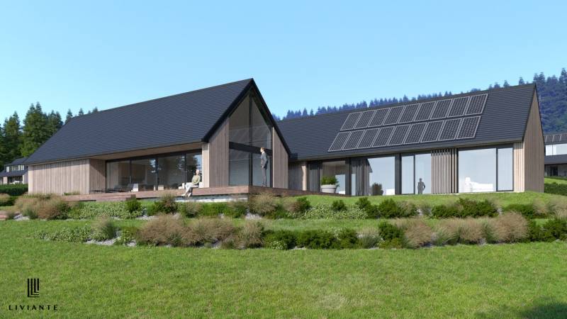 Visualization of a low-energy house on development plots with clean lines and solar panels in Tajov.