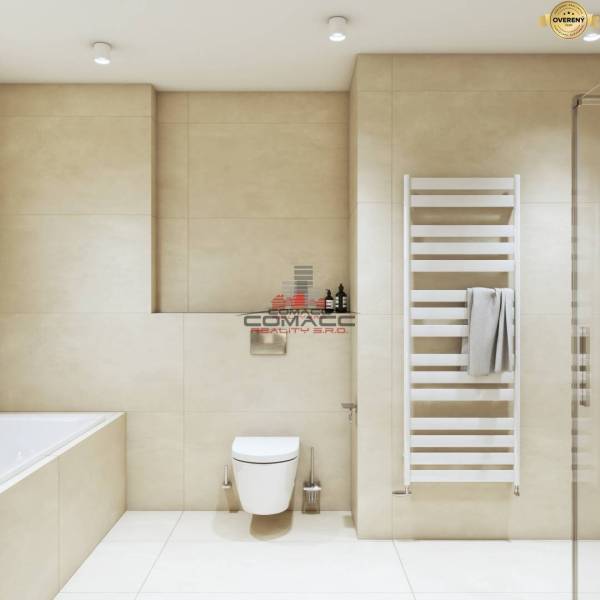 A bathroom in a family house with a bathtub, wall-mounted toilet, and radiator.