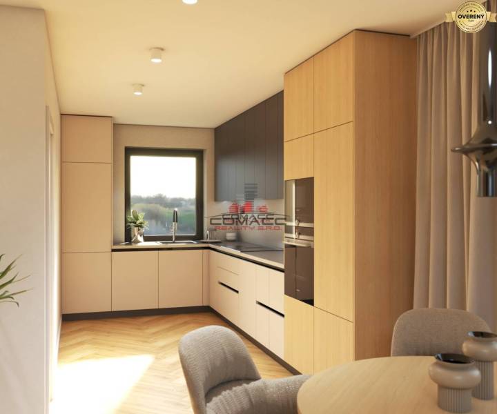 A kitchen in a family house with a wooden decor floor, light cabinets, and a large window.