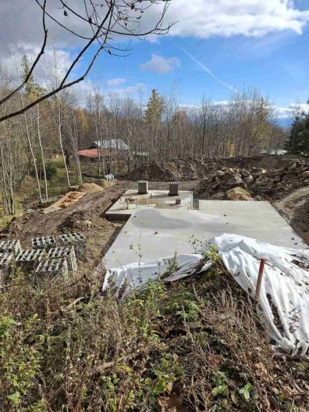 Construction of a recreational apartment in Starý Smokovec with concrete foundations amidst nature.