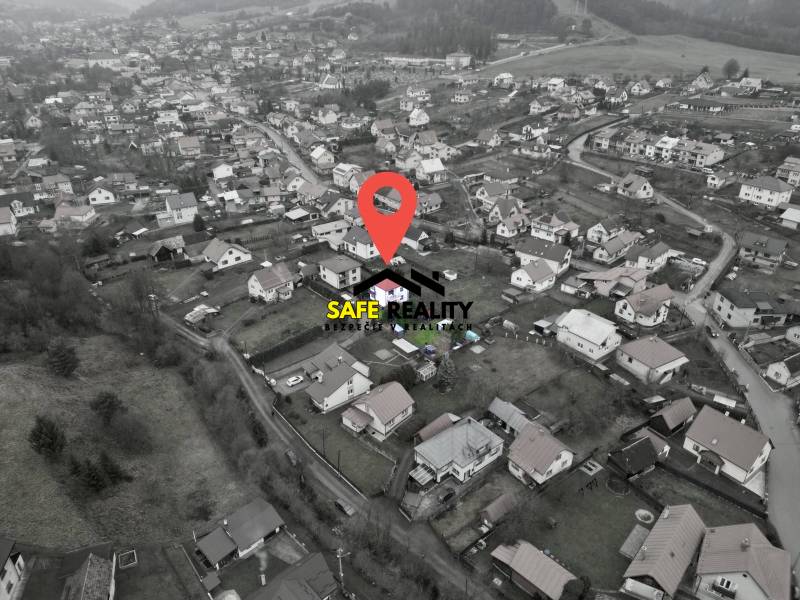 A top-down view of the layout of family houses in Nesluša with the designated area highlighted.