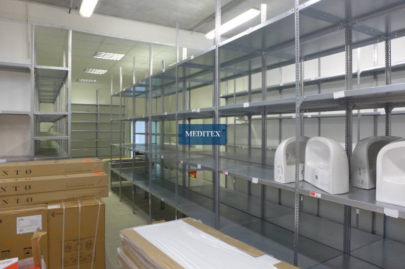 Shelving systems in commercial spaces with sinks and packaged goods.