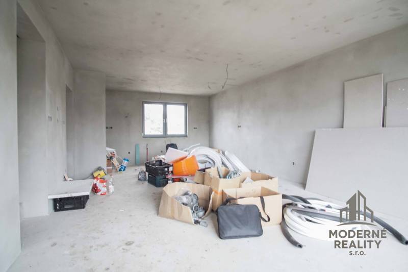 Renovated room in a family house with plastic pipes and boxes.