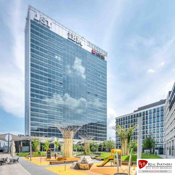 Bratislava - Old Town; Offices on Pribinova Street with a playground in the foreground.